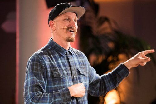 Mick Ebeling of Not Impossible gives a keynote during the summit.