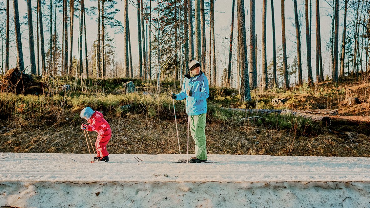 Man and child in snow